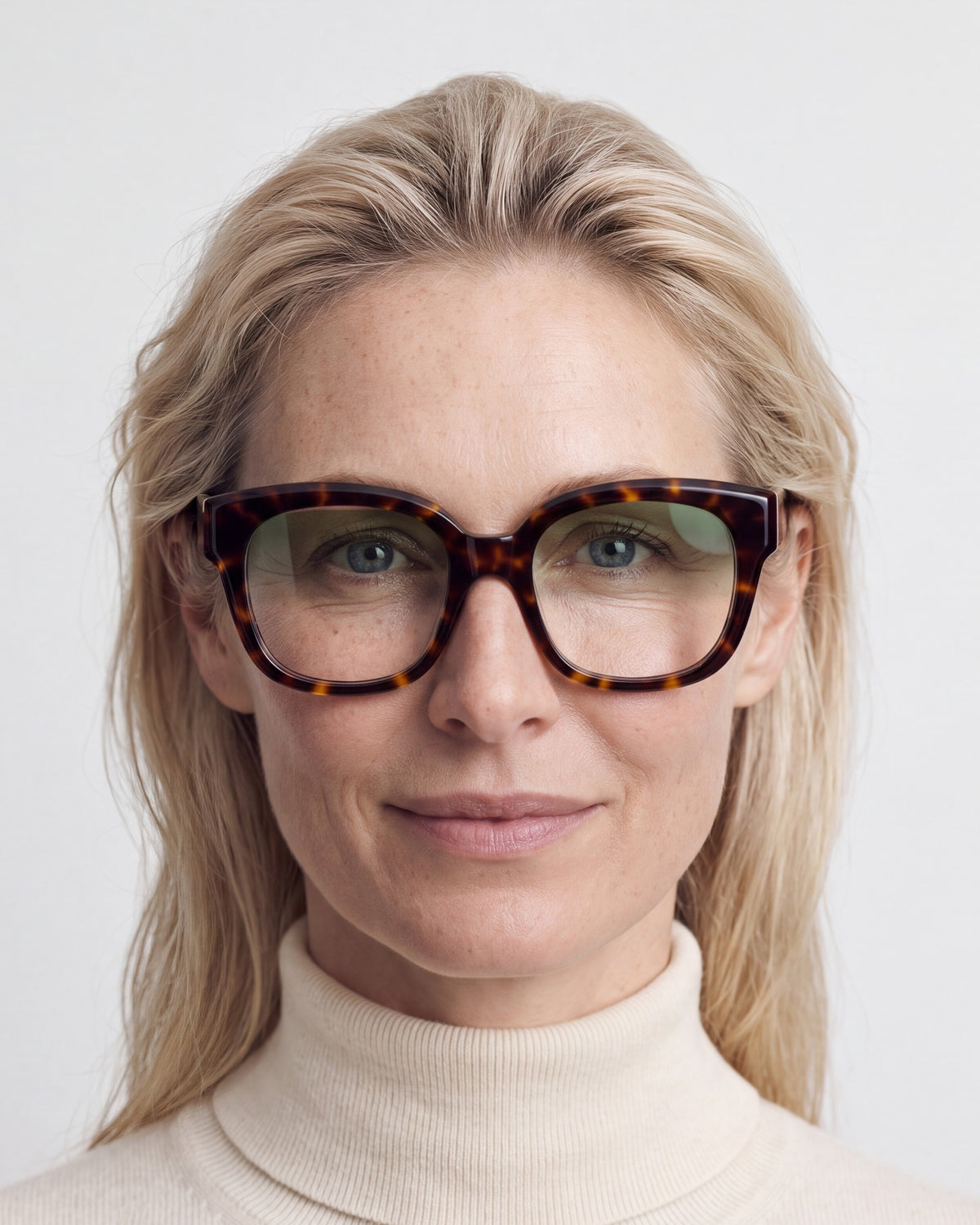 Chloe in tortoiseshell, worn, Sage lenses