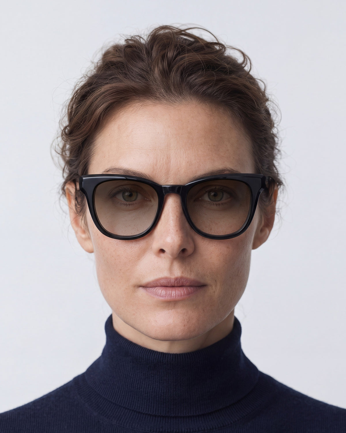 Zoey in black, worn, sun lenses